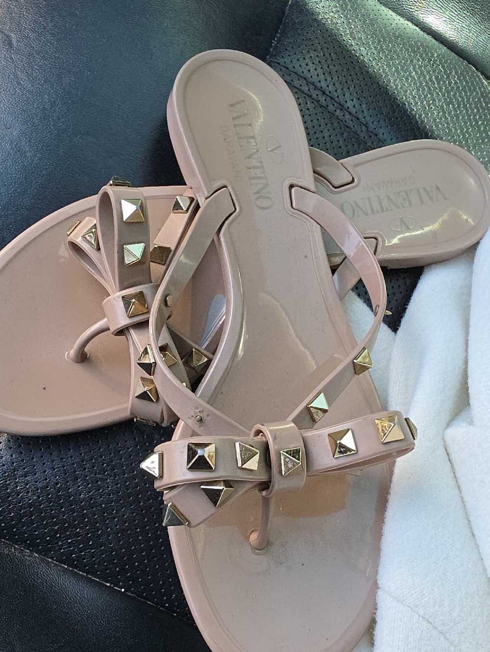 Valentino Garavani Jelly Bow Sandals with Gold Rockstuds in Blush Pink